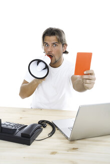 Man showing red card, using megaphone, close-up - PKF00119