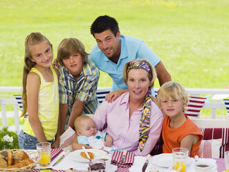 Family in garden with baby - WESTF06168