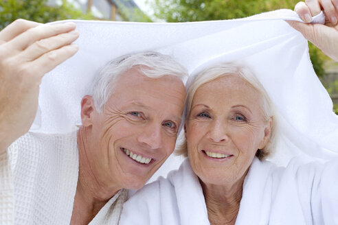 Germany, portrait of a senior couple in spa, close-up - BABF00380