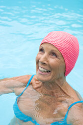 Germany, senior woman in pool - BABF00288