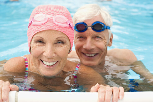 Germany, Senior couple in swimming pool - BABF00271