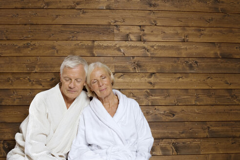 Germany, Senior couple wearing bath robes - BABF00233