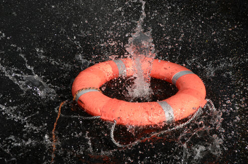 Life preserver floating on water, close-up - CRF01382