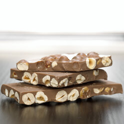 Chocolate with hazelnuts, close-up - CHKF00524