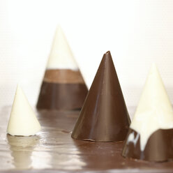 Chocolate cone-shaped, close-up - CHK00842