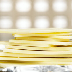 Stacked white chocolate bars, close-up - CHK00840