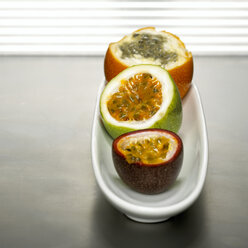 Passion fruits in bowl - CHK00733