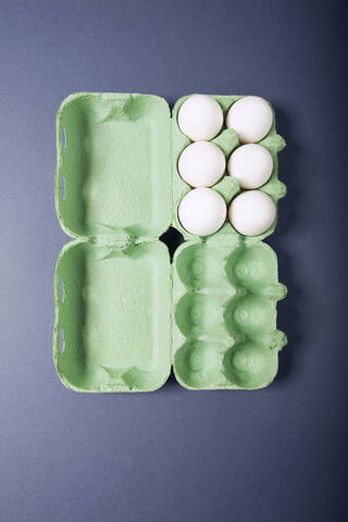 Fresh eggs in box, elevated view stock photo