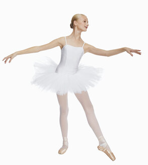 Young ballerina (14-15) dancing, portrait - KMF01158