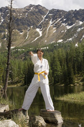 Young woman practicing tae kwon do - HHF01670