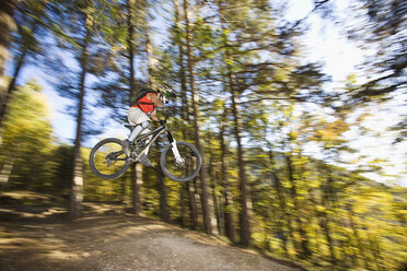 Italy, Southern Tyrol, man mountain biking - FFF00855