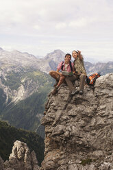 Austria, Salzburger Land, couple on mountain top - WESTF07621
