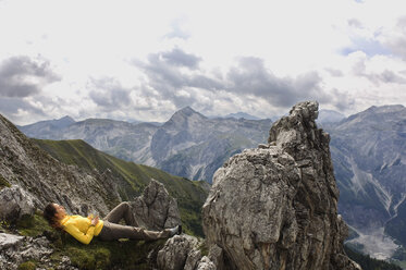 Austria, Salzburger Land, young woman relaxing - WESTF07592