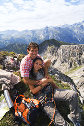 Austria, Salzburger Land, couple on mountain top, portrait - WESTF07558