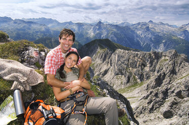 Austria, Salzburger Land, couple on mountain top, portrait - WESTF07557