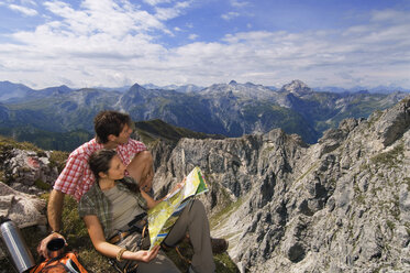 Austria, Salzburger Land, couple on mountain top, portrait - WESTF07554