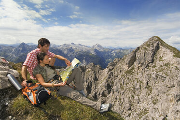 Austria, Salzburger Land, couple on mountain top, portrait - WESTF07553
