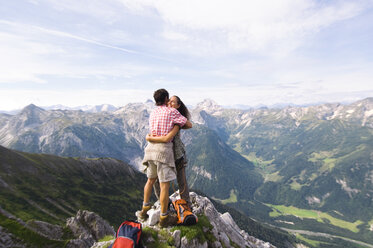 Austria, Salzburger Land, couple embracing - WESTF07547