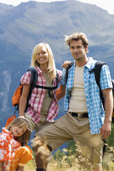 Austria, Salzburger Land, couple with son (8-9) hiking - HHF01809
