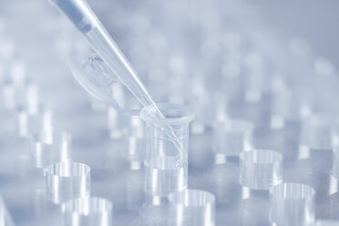 Genetic engineering, using a pipette, close up - RDF00302