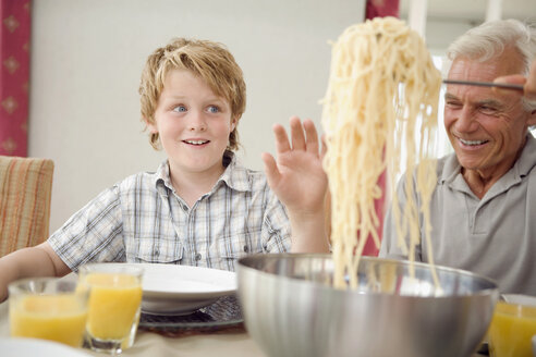 Family taking lunch at home - HKF00204