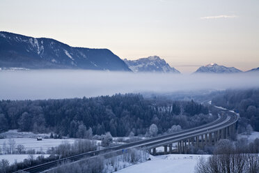 Germany, Bavaria, Highway bridge with mountain landscape - FOF00475