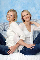 Two blonde women, smiling, portrait - DKF00143