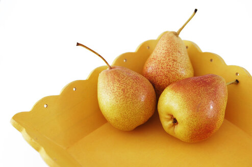 Three pears on a tray, close up - 00369LR-U