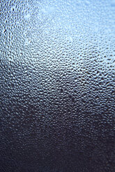 Waterdrops on window pane, close up - THF00763
