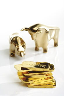 Bull and bear sculptures by gold bars - 08629CS-U