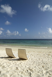 Maledives, Gan, Chairs on beach - GNF00970