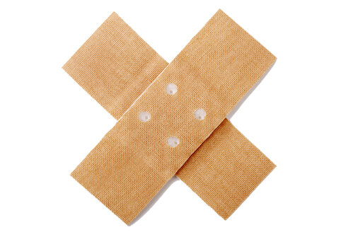 Cross adhesive bandages, close-up - TCF00714