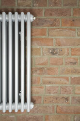 Radiator on brick wall, close-up - GWF00667