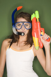 Young woman with diving goggles and water pistol - RDF00759