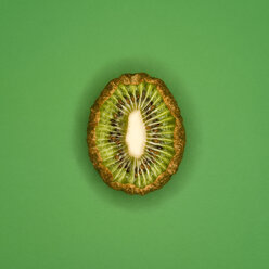 Rotting kiwi, sliced, elevated view - MUF00403