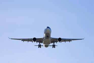 Spain, Andalusia, Malaga, Aeroplane landing, low angle view - MSF02249