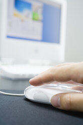 Man using computer mouse, close-up - JRF00023