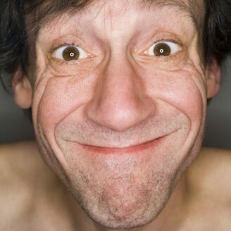 Man pulling funny face, close-up, portrait - MUF00565