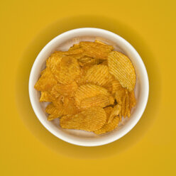 Bowl of crisps, elevated view - MUF00529