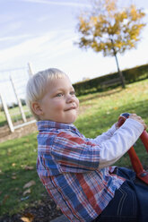 Little boy (2-3) playing on playground - SMO00250