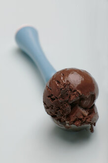 Scoop of chocolate ice cream on ice cream scoop - SCF00309