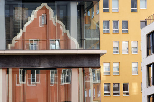 Reflection of an old building in a glass facade - 00450LR-U