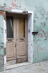 Italy, Venice, Old house, Broom leaning against wall - AWDF00203