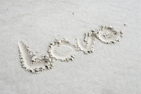 Deutschland, Amrum, Das Wort Liebe in Sand geschrieben, lizenzfreies Stockfoto