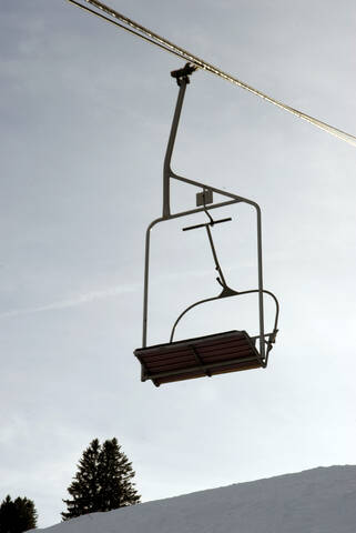 Germany, Allgaeu, Empty ski lift chairs stock photo