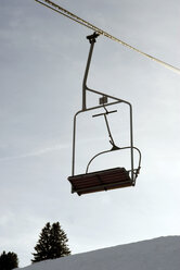 Germany, Allgaeu, Empty ski lift chairs - AWDF00082