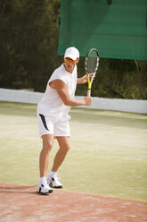 Mann spielt Tennis - UKF00157