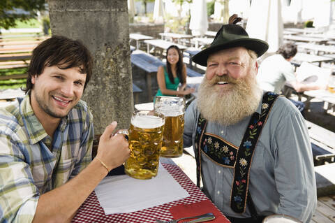 Germany, Bavaria, Upper Bavaria, People in beer garden stock photo