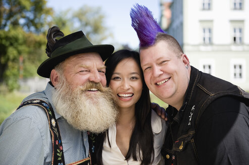 Germany, Bavaria, Upper Bavaria, Three people having fun, smiling, portrait - WESTF09549