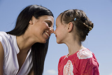 Mother and daughter (6-7), nose to nose, close up - CLF00584